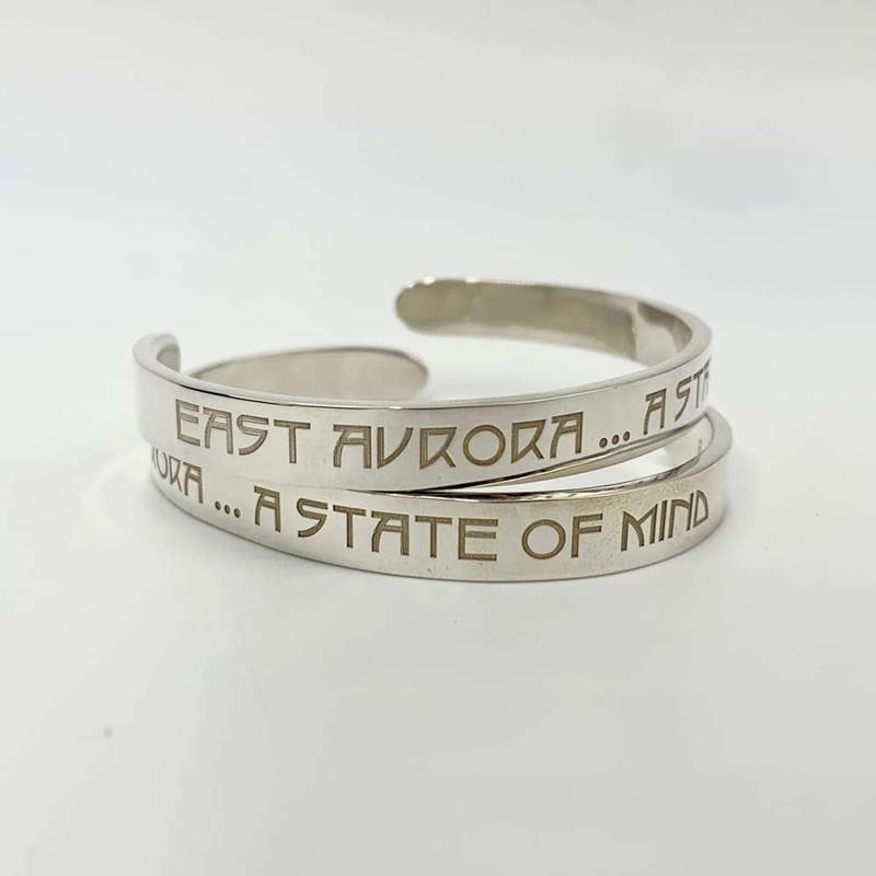 Cuff, East Aurora Motto